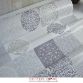 Tessuto in pvc al metraggio fantasia e tinta unita.